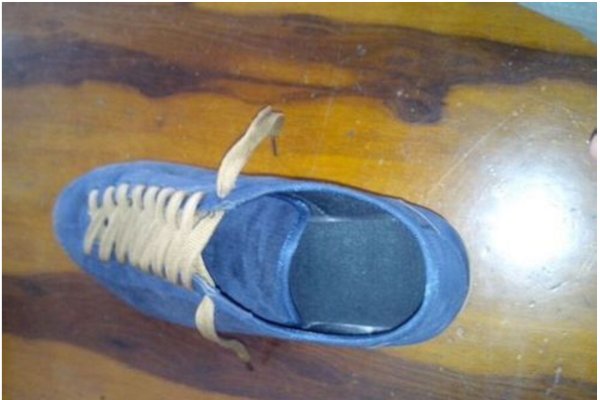 怎样才能把鞋带系在里面图片教