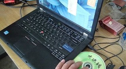 如何用迅雷看看播放光盘里的电影?